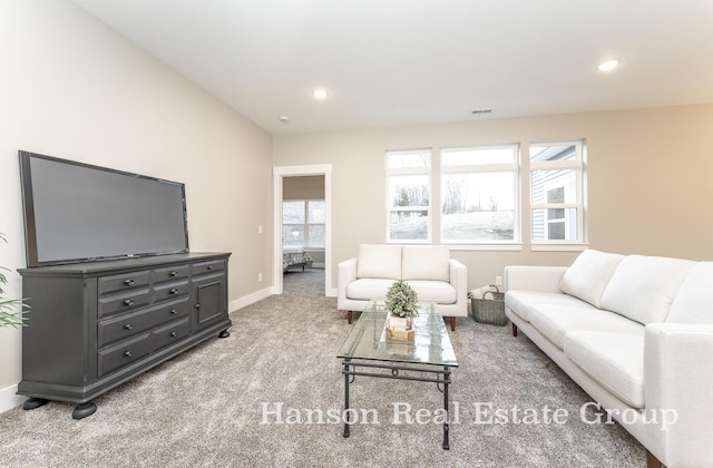 living room with light colored carpet