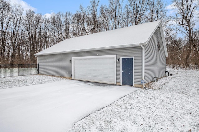 view of snow covered garage