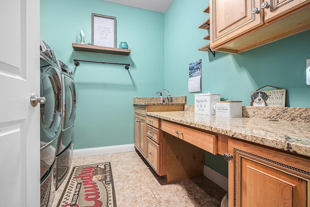 laundry area with cabinets, separate washer and dryer, and light tile patterned flooring