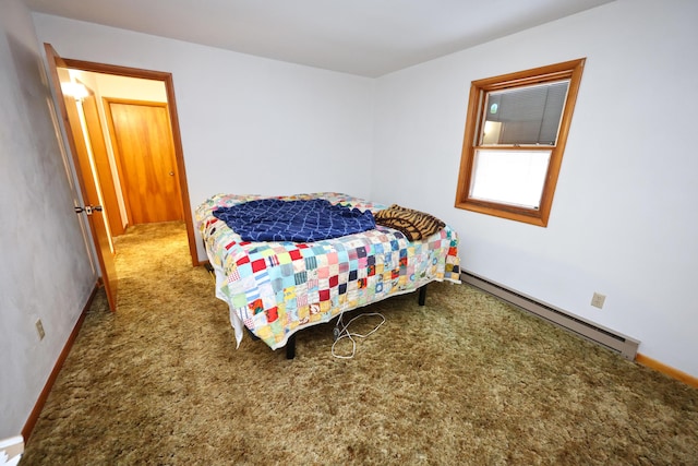 bedroom featuring carpet flooring and a baseboard radiator