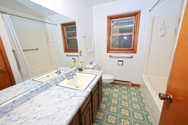 bathroom with toilet, a baseboard heating unit, and vanity