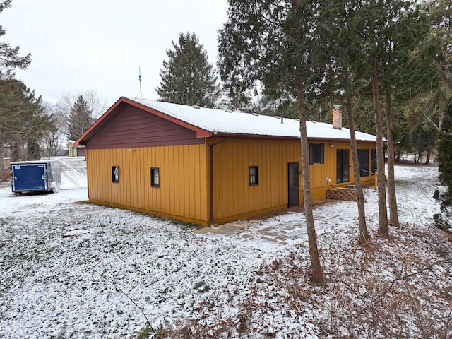 view of snow covered property