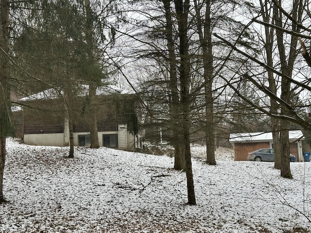 view of yard covered in snow