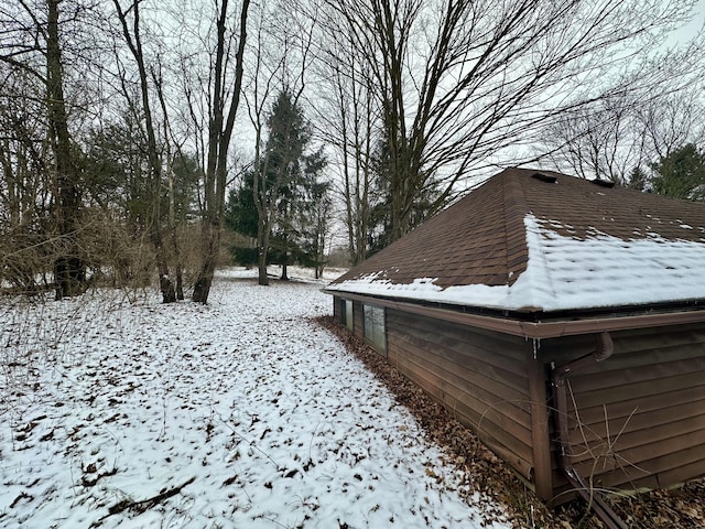 view of yard covered in snow