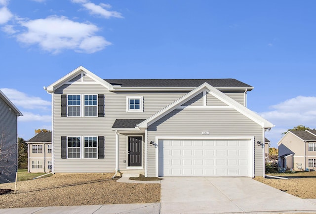 view of front of home with a garage