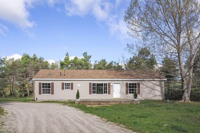 view of front of house with a front lawn