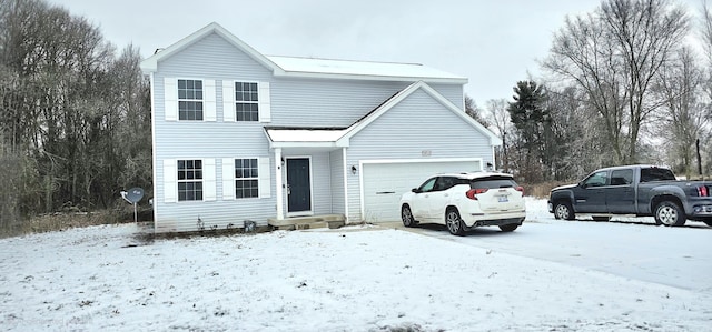 view of front of home with a garage