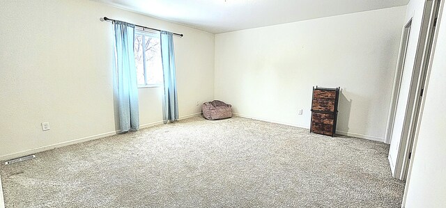 unfurnished room with carpet