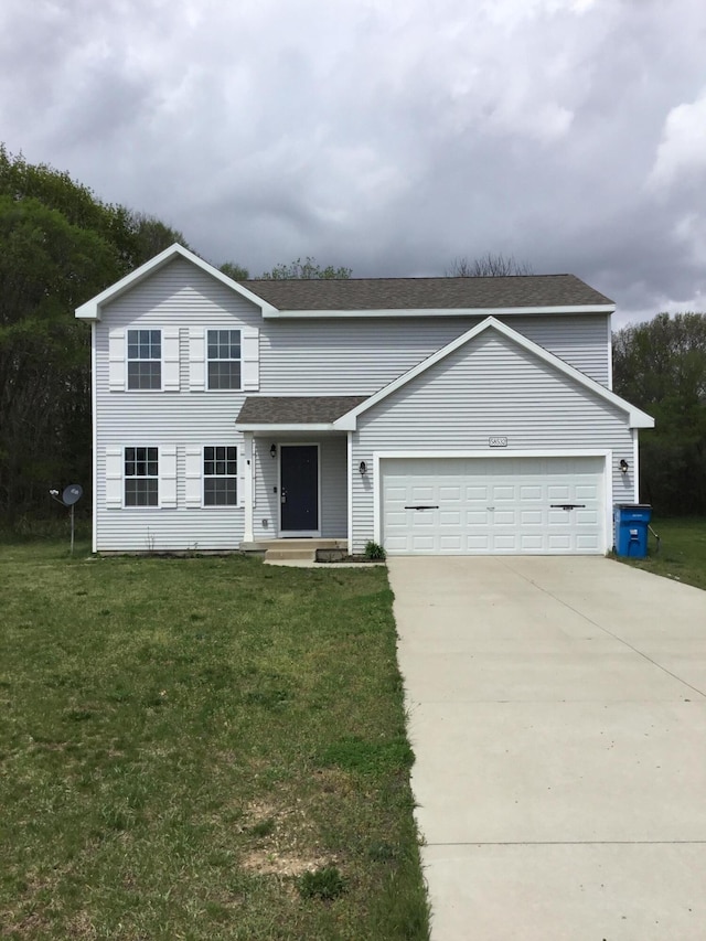 traditional-style home featuring an attached garage, driveway, a shingled roof, and a front yard