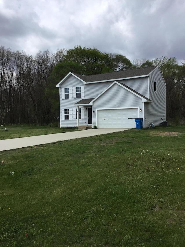 traditional home featuring roof with shingles, an attached garage, driveway, and a front yard