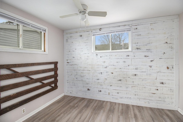 empty room with wood-type flooring