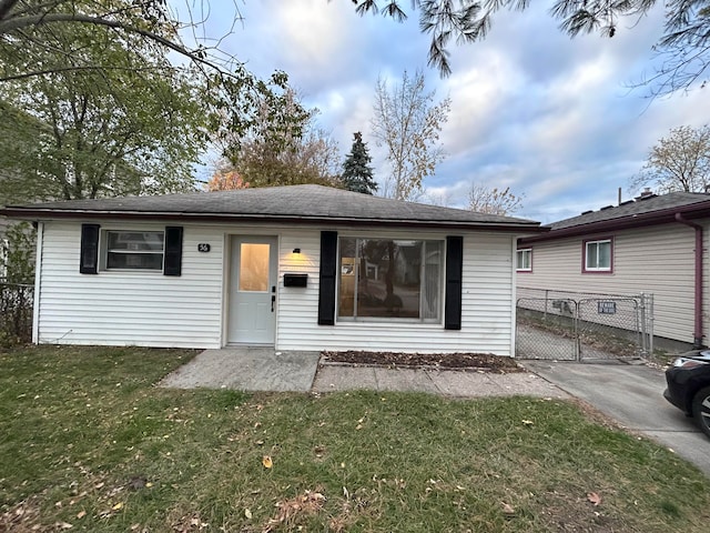 view of front of home with a front yard