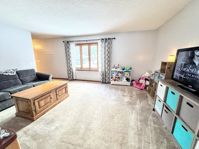 carpeted living room featuring a textured ceiling