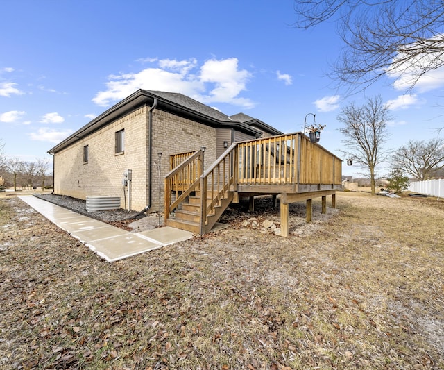 exterior space featuring a wooden deck