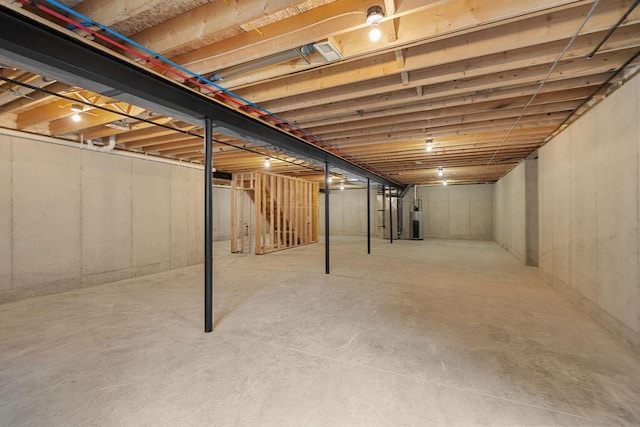 basement featuring water heater