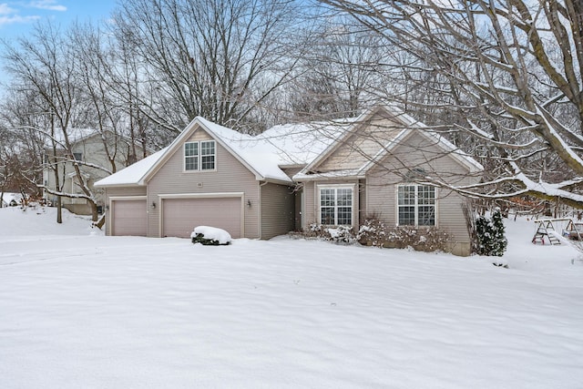 view of front of property featuring a garage