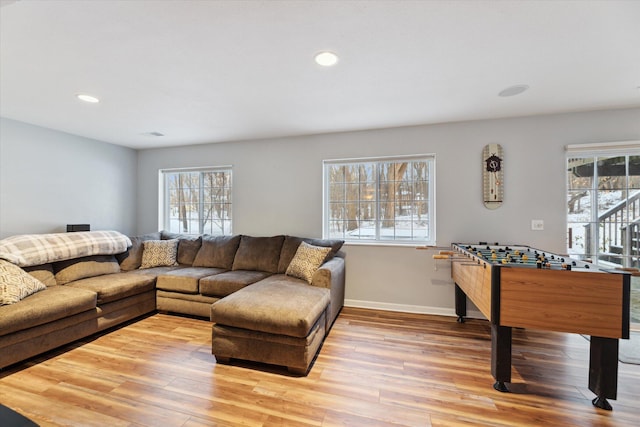 living room with light hardwood / wood-style flooring