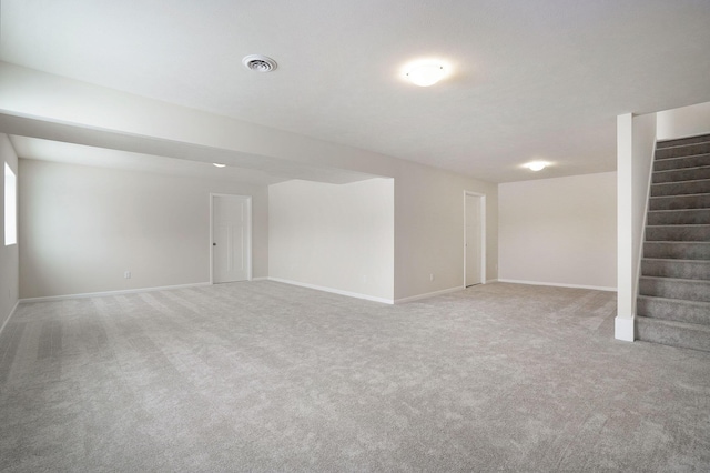 basement with carpet flooring