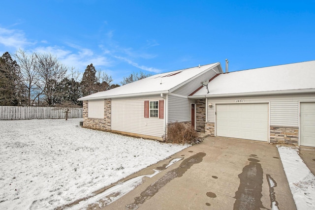 ranch-style house with a garage