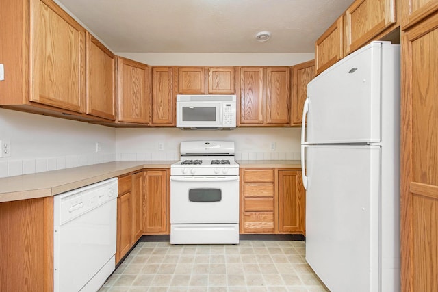 kitchen featuring white appliances