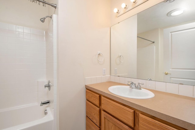 bathroom featuring vanity and shower / bath combination