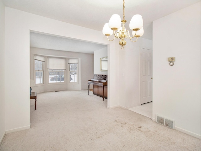 interior space with a chandelier