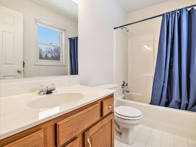 full bathroom with tile patterned flooring, shower / bath combination with curtain, vanity, and toilet