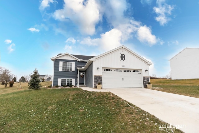 view of front of house featuring a garage and a front yard