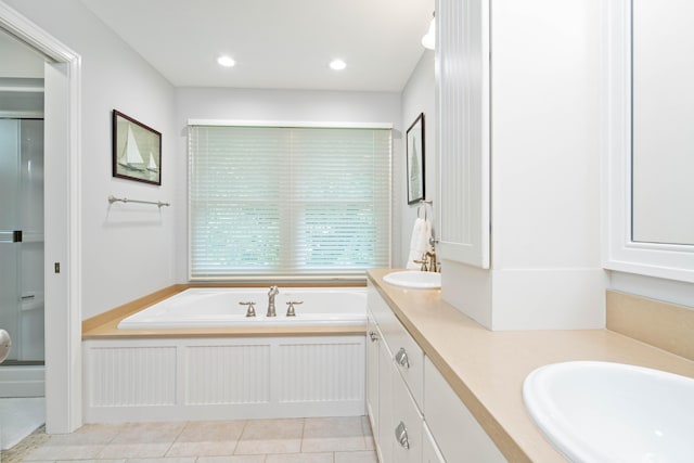 bathroom with separate shower and tub, tile patterned flooring, and vanity