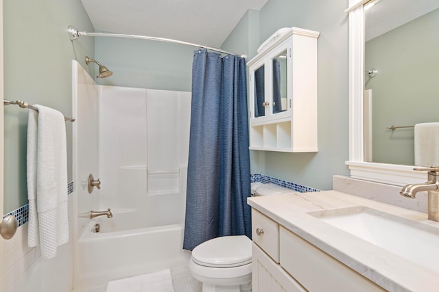 full bathroom with vanity, shower / bathtub combination with curtain, and toilet