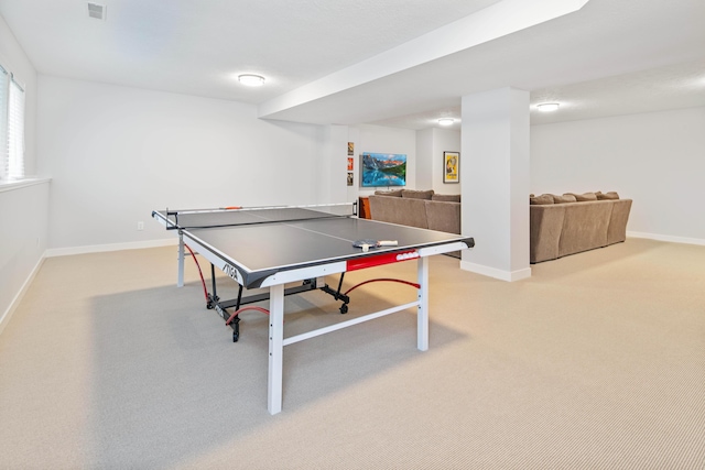 recreation room featuring light colored carpet