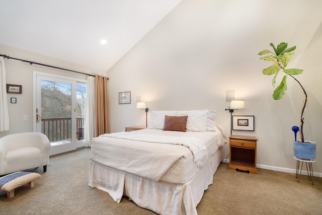 bedroom featuring access to exterior, light colored carpet, and vaulted ceiling