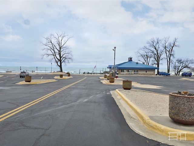 view of street featuring a water view