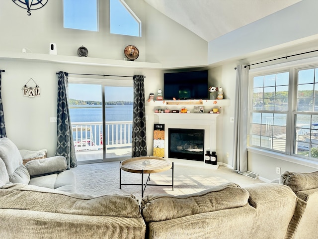 living room with carpet flooring and lofted ceiling