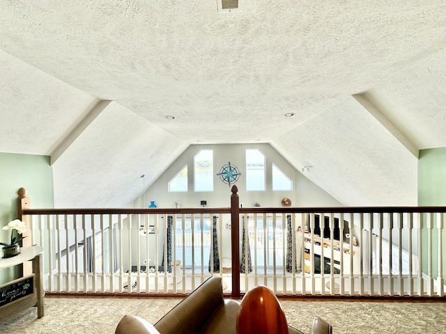 bonus room with carpet flooring, a textured ceiling, and vaulted ceiling