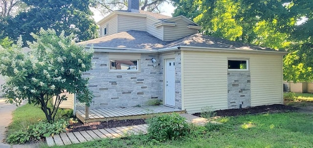 view of home's exterior with a yard