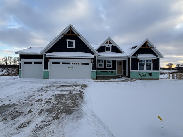 craftsman-style home with a garage