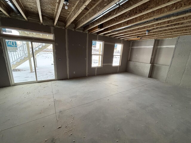 miscellaneous room with concrete flooring