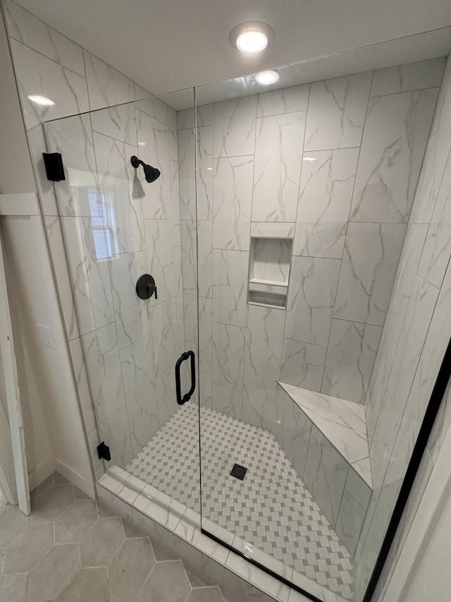 full bathroom featuring a shower stall