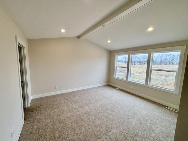 carpeted empty room featuring lofted ceiling with beams, recessed lighting, visible vents, and baseboards