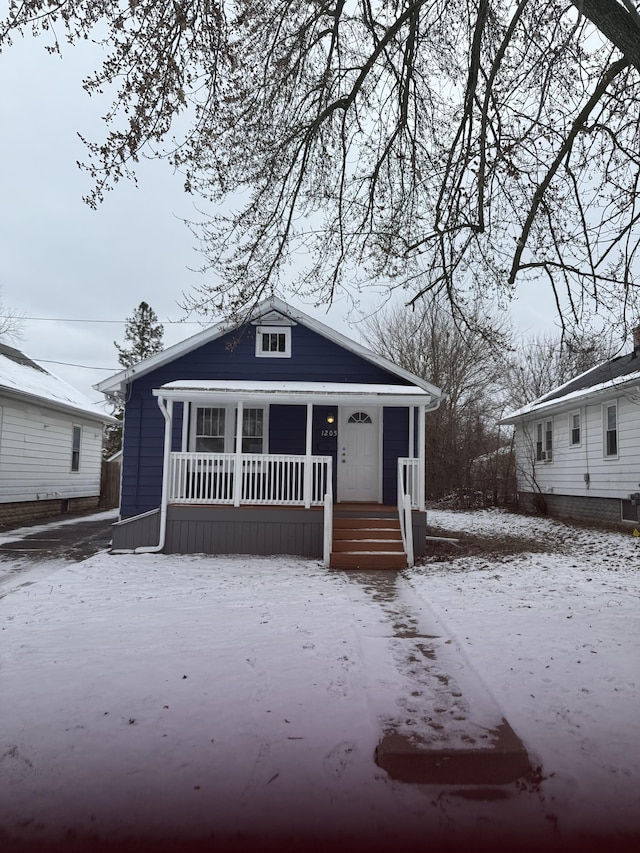 bungalow-style home featuring covered porch