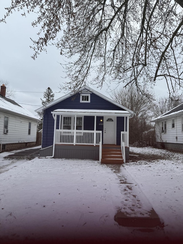 bungalow-style home with covered porch