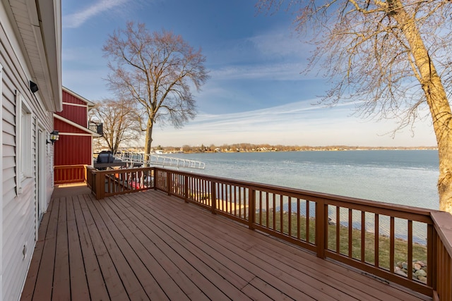 wooden terrace with a water view