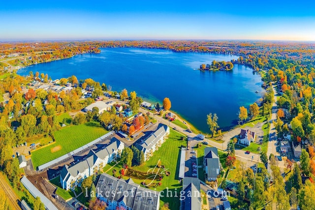 bird's eye view featuring a water view and a residential view
