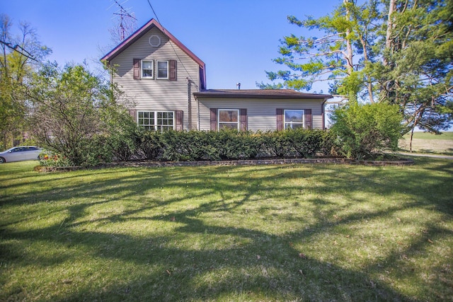 exterior space with a front lawn