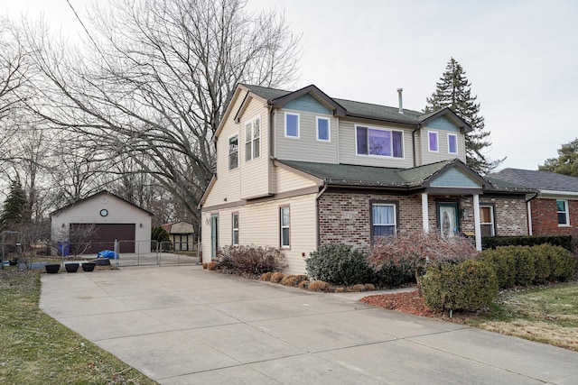 view of home's exterior with a garage and an outdoor structure