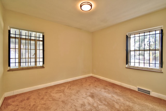 view of carpeted spare room