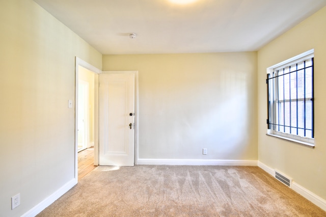 view of carpeted spare room