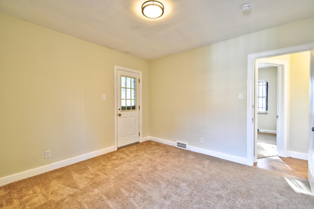 view of carpeted spare room