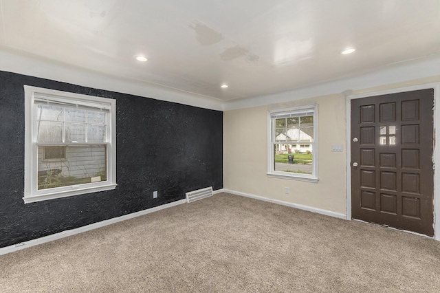 view of carpeted spare room